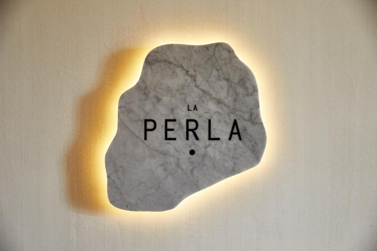 ザ プラザ ホテル パイオニア パーク エル・パソ エクステリア 写真 La Perla logo